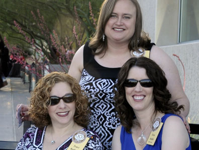 Photo of three women alumni