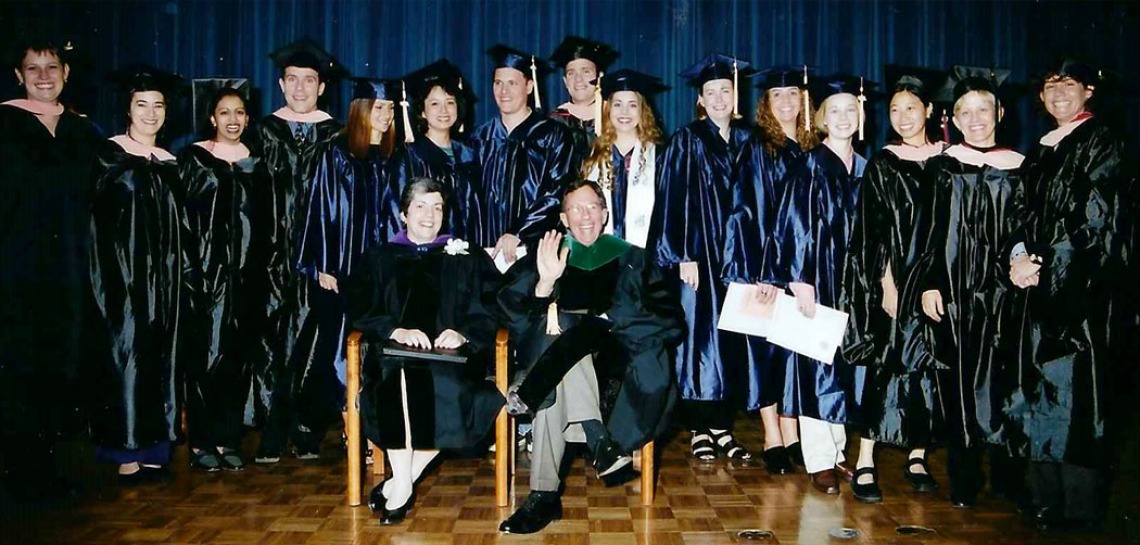Former Arizona Governor, Janet Napolitano, and Dr. Carlos "Kent" Campbell with College of Public Health Graduating Class, December 2000